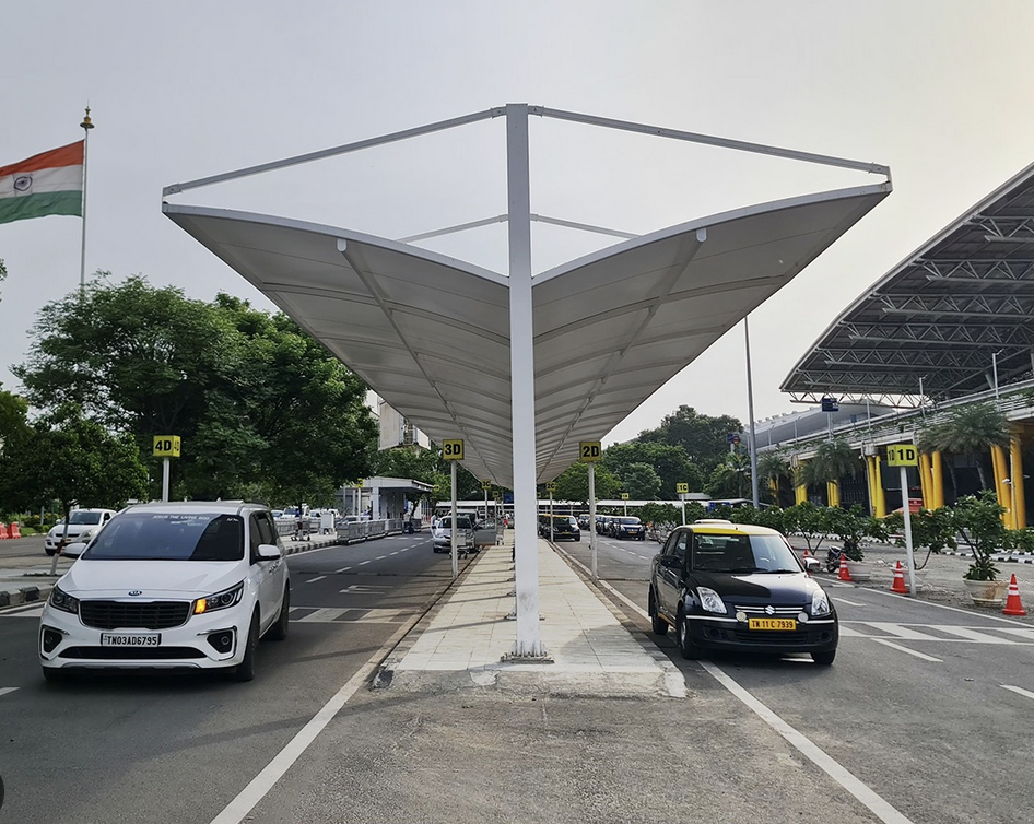 Cars parked outside Chennai International Airport ready for airport transfer services